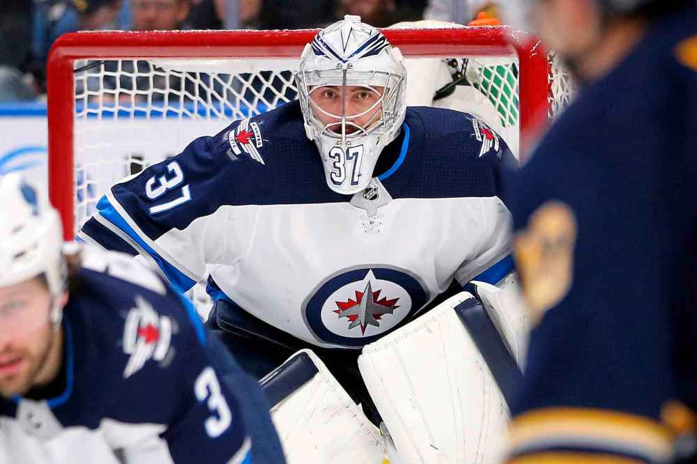 (AP Photo/Jeffrey T. Barnes)
Winnipeg Jets goalie Connor Hellebuyck was having a Vezina-calibre season and was even in the discussions for the Hart trophy, when the NHL decided to pause its season due to COVID-19 concerns.