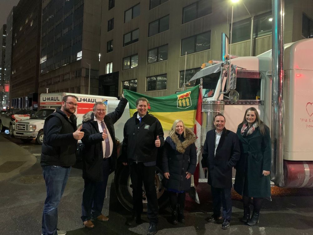 SOURCE: @KevinWaugh_CPC
Conservative Party of Canada MPs pose for a photograph with protesters in Ottawa which was tweeted out by Saskatchewan MP Kevin Waugh on February 2.