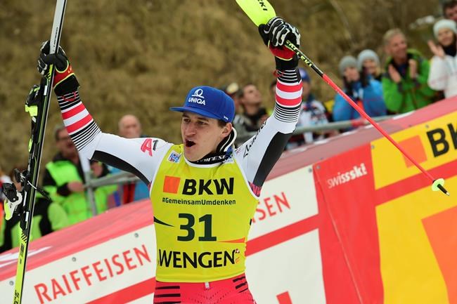 First placed Austria's Matthias Mayer celebrates at the end of an alpine ski, men's World Cup combined in Wengen, Switzerland, Friday, Jan. 17, 2020. (AP Photo/Marco Tacca)