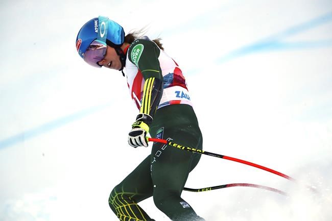 United States' Mikaela Shiffrin stands on the course during an alpine ski, women's World Cup Women's Alpine Combined, in Altenmarkt-Zauchensee, Austria, Sunday, Jan. 12, 2020. (AP Photo/Marco Trovati)