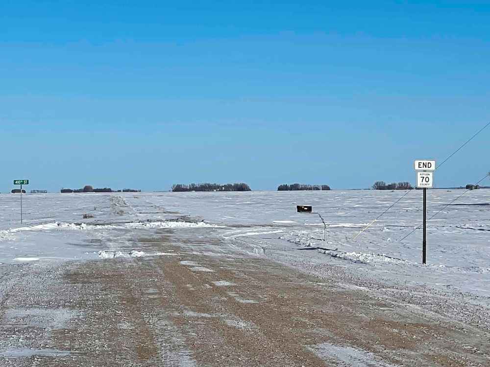 A view of the landscape outside the hamlet of St. Vincent, Minn., looking north towards the Canada-U.S. border, is shown on on Tuesday, Jan. 25, 2022, not far from where RCMP officers recovered the bodies of four Indian nationals Jan.19. Investigators believe the family of four was part of a larger group trying to enter the U.S. illegally. Border Patrol officers arrested a Florida man, Steve Shand, who now faces human-smuggling charges. THE CANADIAN PRESS FILES/James McCarten