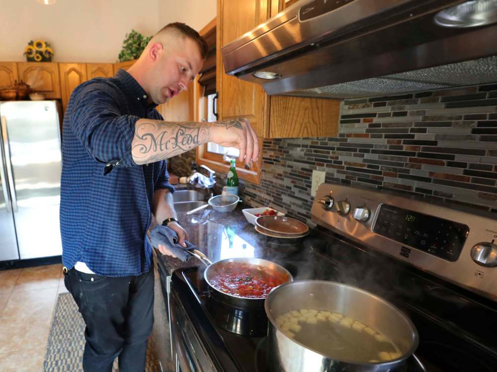 RUTH BONNEVILLE / WINNIPEG FREE PRESS
Even though pasta is part of his job as head chef at Harth, Brent Genyk loves to take the time to make it at home as well.
