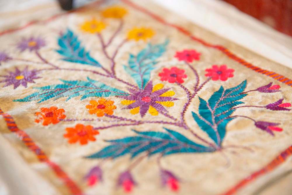 Floral quillwork on that might have been used as a letter case. The vibrant colours are sensitive to light. (Mike Deal / Winnipeg Free Press)