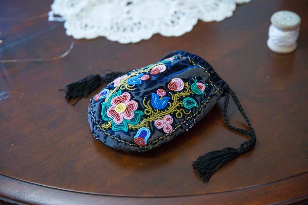 A beadworked tobacco pouch. (Mike Deal / Winnipeg Free Press)