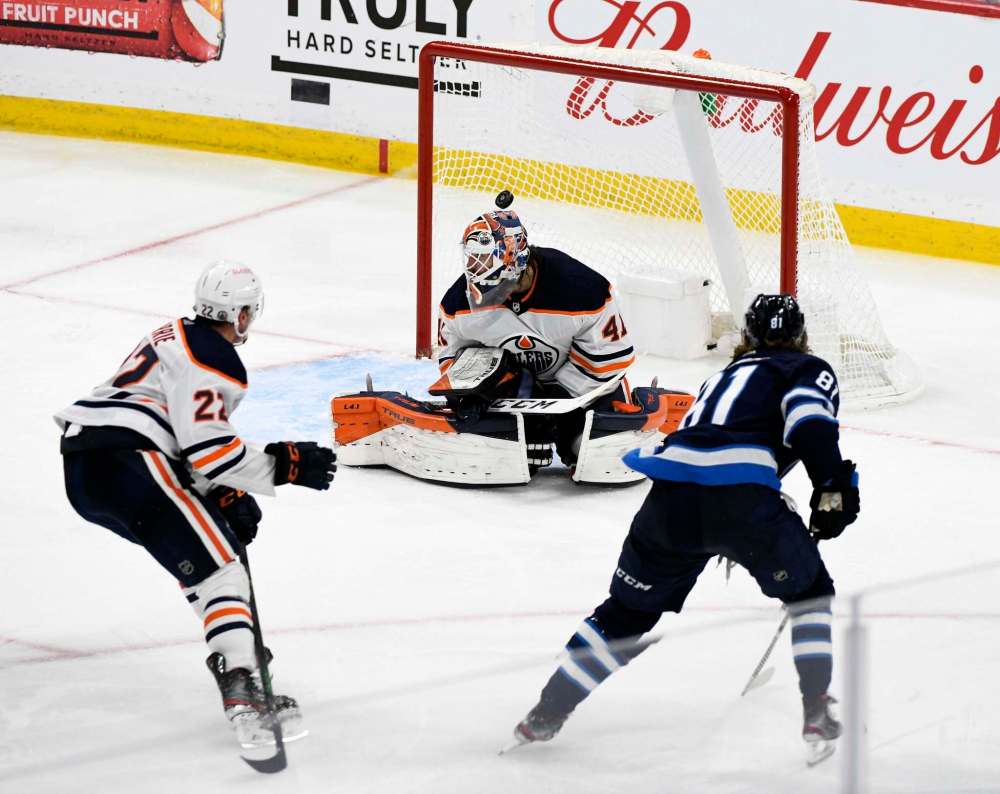 Fred Greenslade / The Canadian Press
Kyle Connor's triple overtime goal early Tuesday morning clinched the Jets' first-round sweep of the Edmonton Oilers.