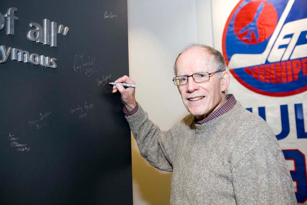 supplied
Drybrough signs the Manitoba Sports Hall of Fame’s signature wall following his induction in 2009.
