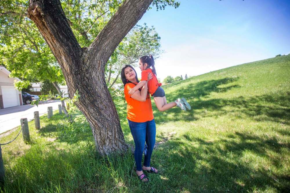 MIKAELA MACKENZIE / WINNIPEG FREE PRESS Erica Daniels, who directed the newly-released eight-part series documenting the Seven Sacred Teachings, poses for a portrait with her daughter, Serenity (three), at Braeside Park in Winnipeg on Thursday, June 3, 2021. For Ben Waldman story. Winnipeg Free Press 2021.