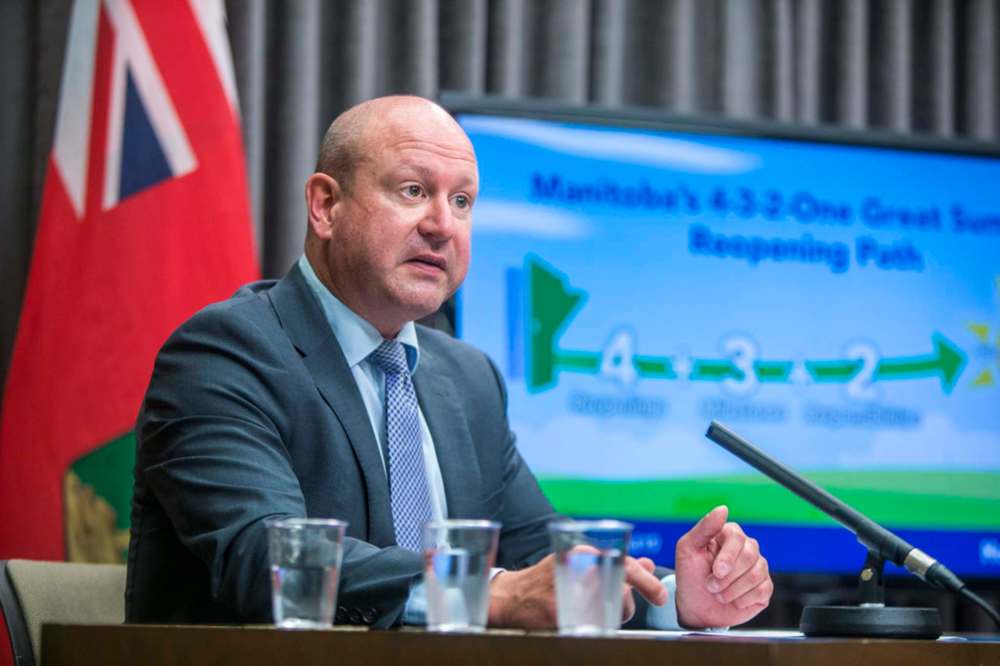 MIKAELA MACKENZIE / WINNIPEG FREE PRESS<
Dr. Brent Roussin, chief provincial public health officer, outlines the details of the summer reopening plan, Thursday.