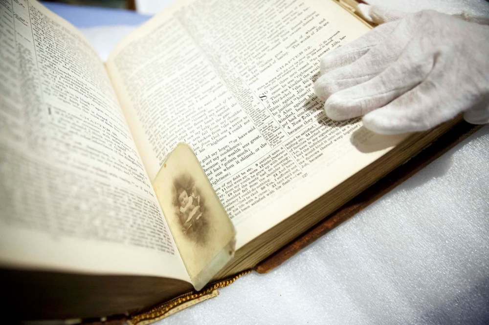The Slater Brown family bible from 1904 that had a photo of Alice Taylor, daughter of the Honourable John Taylor and Francis Jane Brown from 1874. (Mike Deal / Winnipeg Free Press)