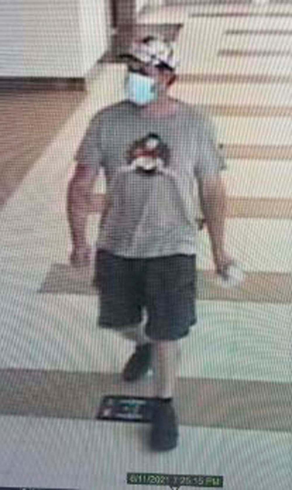 Surveillance footage showing Eric Wildman at the Winnipeg International Airport where he enters the terminal and approaches a car rental kiosk on June 11.