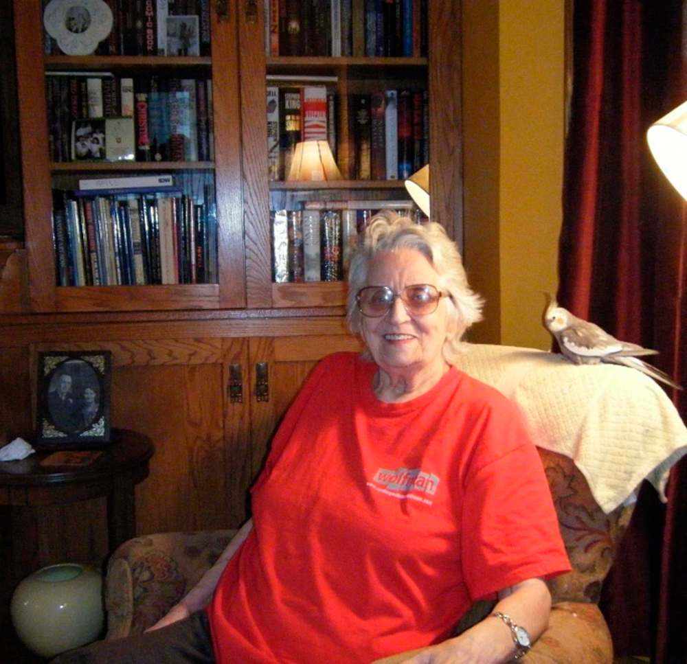 Supplied photos
Quick-witted Lorna Christianson, seen here with her pet bird, cared about helping others and moved through the world without judgment. Christianson died in October at the age of 88.
