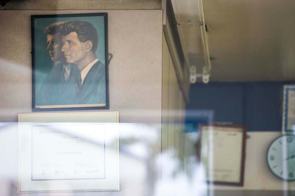 The picture of the Kennedys has been on the wall for more than 50 years. (Mikaela MacKenzie / Winnipeg Free Press)