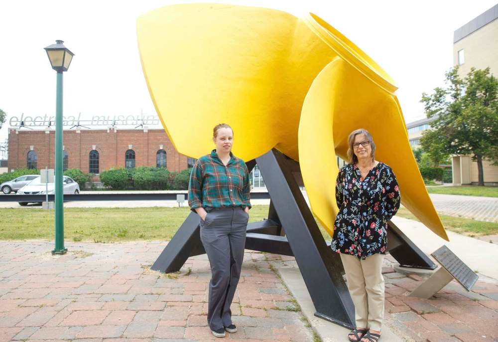 MIKE DEAL / WINNIPEG FREE PRESS
Shauna Matthews (left) assistant museum administrator, and Pam McKenzie, administrator, by the propeller turbine outside the Electrical Museum.