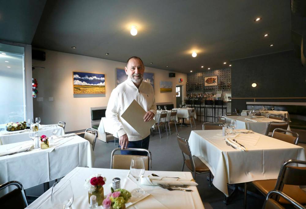 RUTH BONNEVILLE / WINNIPEG FREE PRESS
Scot McTaggart, owner of Fusion Grill, said his sales have dropped 75 per cent since the new restrictions — which include a 50 per cent capacity limit on restaurants — took effect Dec. 21.