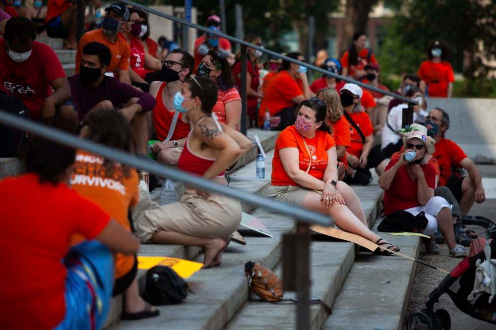 Protestors occupy the steps on the Manitoba legislature. (Daniel Crump / Winnipeg Free Press)