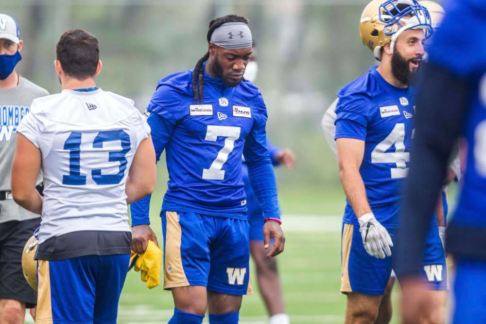 Defensive back Josh Johnson (7) wears Mercy Maston's jersey at Bombers training camp in Winnipeg on Monday. (Mikaela MacKenzie / Winnipeg Free Press)