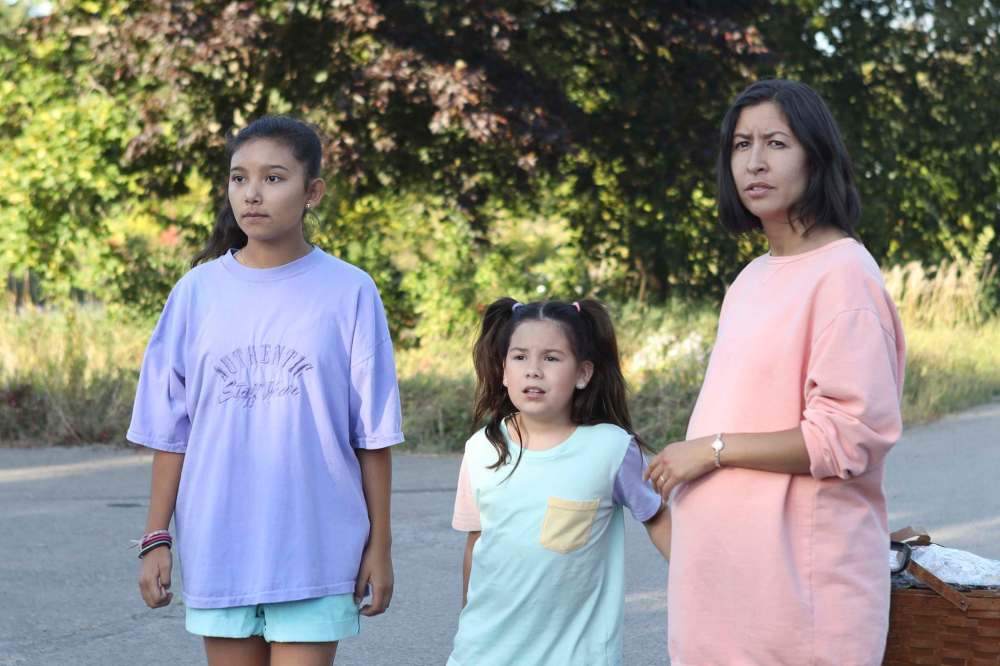 Mongrel Media
Beans (portrayed by Kiawentiio, left) sees her adolescent issues exacerbated by the Oka conflict of 1990.