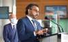 RUTH BONNEVILLE / WINNIPEG FREE PRESS
Transport Minister Omar Alghabra makes a funding announcement at Winnipeg Richardson International Airport, Tuesday. Standing behind him is Barry Rempel, president and CEO of the Winnipeg Airports Authority.