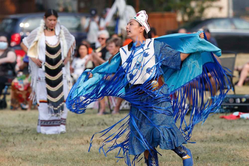 Cierra Roulette, who was also one of the event organizers, dances at the powwow. (John Woods / Winnipeg Free Press)