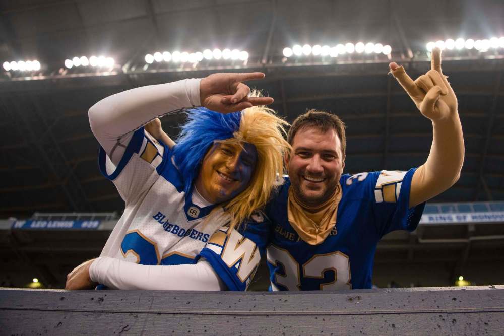 Bombers fans were decked out in blue and gold to celebrate the team's return to the field. (Alex Lupul / Winnipeg Free Press)
