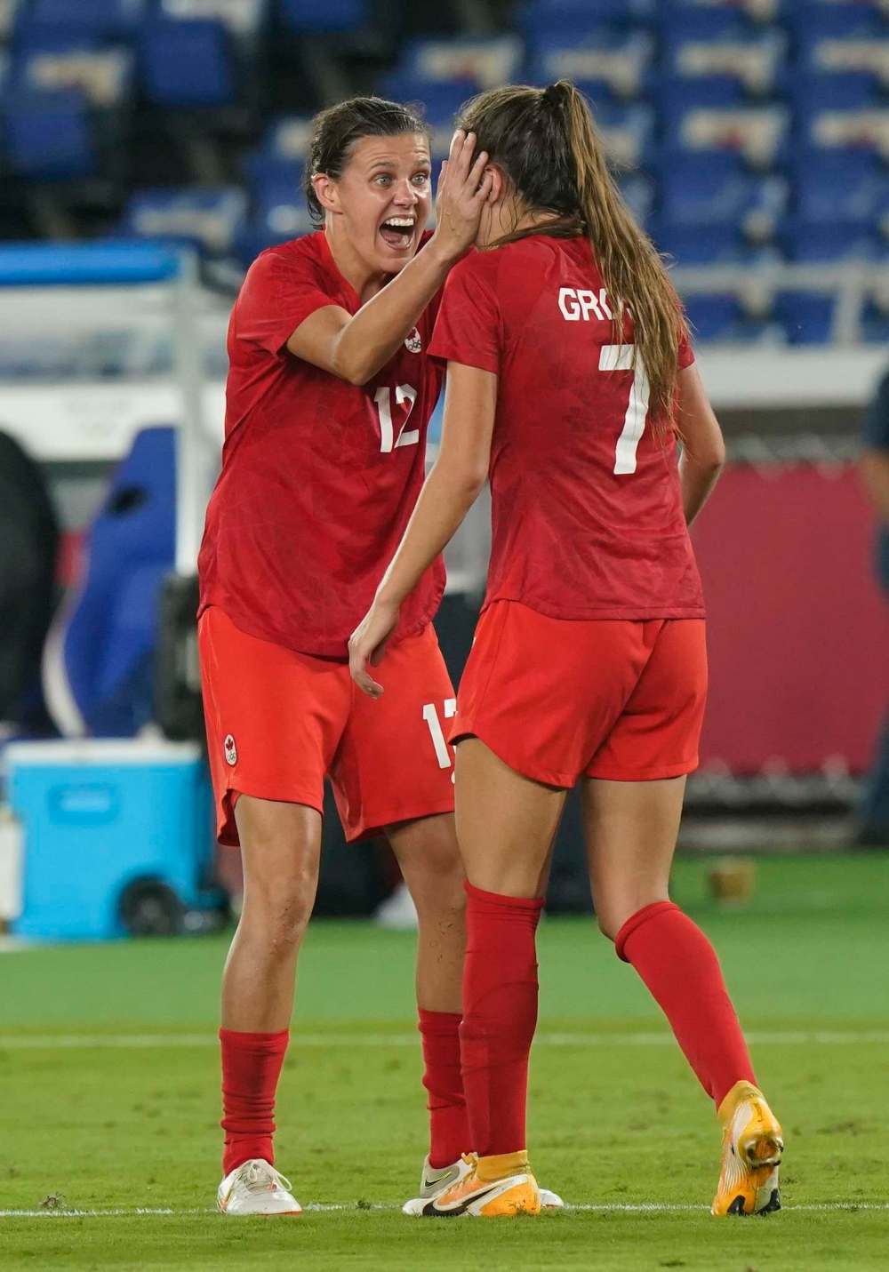 Adrian Wyld / The Canadian Press
Christine Sinclair (left) celebrates with Julia Grosso, who scored the winning penalty kick goal against Sweden, during the women's soccer gold medal game Friday.