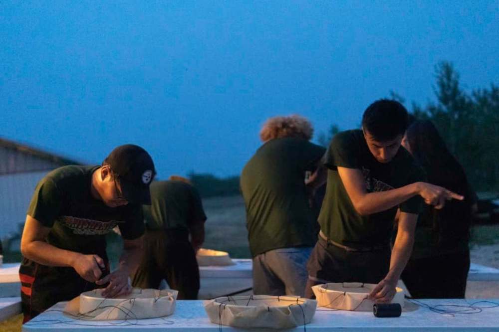 Anishiative campers built traditional drums, learned traditional games, practised somatic therapy through breathing exercises, and were introduced to basic survival skills in workshops led by knowledge keepers. (Supplied)