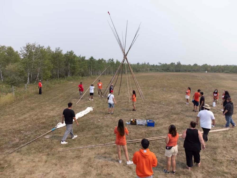 Anishiative campers built teepees together on the first day. (Supplied)
