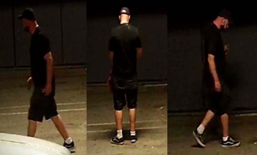 HANDOUT
The suspect in the arson was wearing a blue Adidas baseball hat, black t-shirt, black shorts, black footwear with white soles, and a black mask.