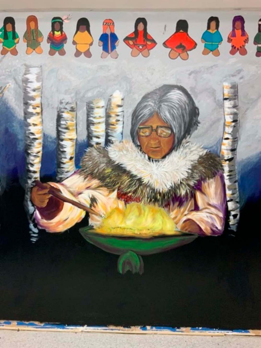 Supplied
This mural showing Elder Annie Bowkett lighting a quilliq is located at Young Minds at 222 Manitoba Ave. in Selkirk. It’s the work of artist Ashley Christiansen, knowledge keeper Jeannie Red Eagle and youth from Promoting Aboriginal Student Success.