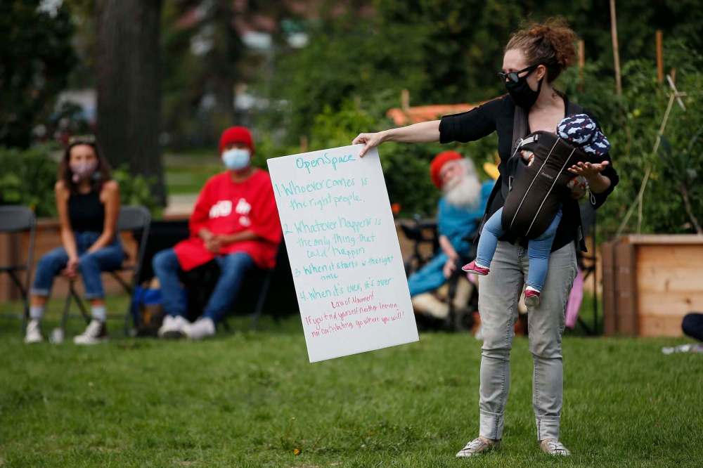 JOHN WOODS / WINNIPEG FREE PRESS
People take part in a Red River Echoes community meeting at Vimy Ridge Park to discuss renaming the Wolseley neighbourhood.