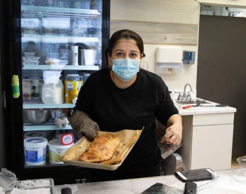 JESSICA LEE / WINNIPEG FREE PRESS
Mariam Hanna holds a freshly-made hawawshi.
