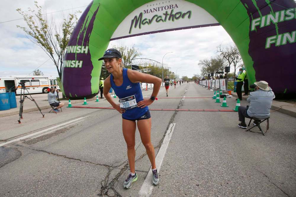 JOHN WOODS / WINNIPEG FREE PRESS
Nicole Walker was the first woman to cross the marathon finish line at the Manitoba Marathon.