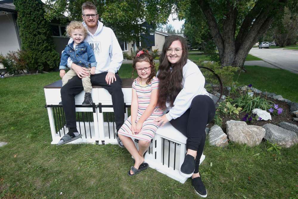 Photos by JOHN WOODS / WINNIPEG FREE PRESS
Matt and Kaelyn Proutt (with their children, Nora and Luxton) started M+K Wood Co., a company that turns out custom-made wooden dog kennels from their home workshop in Selkirk.
