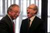 Phil Sheegl (left) with then mayor Sam Katz in 2012. The pair owned land together in Arizona and sold some to Armik Babakhanians, Sheegl's lawyer says. (Boris Minkevich / Winnipeg Free Press files)