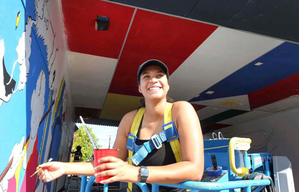 RUTH BONNEVILLE / WINNIPEG FREE PRESS
Artist Bria Fernandes is accustomed to smaller projects with oil and canvas, but is confident and excited about completing Dreamscape in the tunnel on McMicken Street just north of Ellice Avenue.