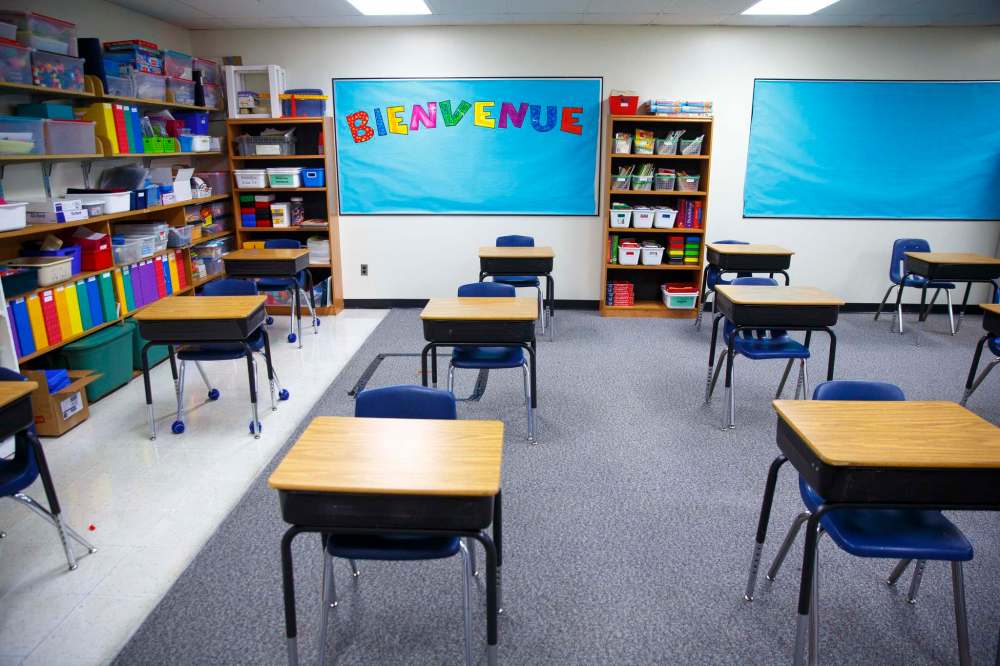 Last year, some families received courtesy notices their child was in a classroom or cohort in which a positive case was identified, but that practice is not required. (Mike Deal / Winnipeg Free Press files)
