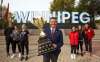 MIKE DEAL / WINNIPEG FREE PRESS
Winnipeg mayor Brian Bowman holds the Duckworth Challenge trophy flanked by UofM Bisons athletes (from left) Owen Schwartz (men's volleyball), Jessica Tsai (soccer), and Taylor Randall (women's basketball), UofW Wesmen athletes, Chantal Boulet (soccer), Mikaela Cameron (women’s volleyball), Darian Picklyk (men's volleyball). The 30th anniversary of the Duckworth Challenge kicks off later this week re-igniting the annual rivalry series between the two Winnipeg universities that now includes men's and women's basketball, men's and women's volleyball, and women's soccer.