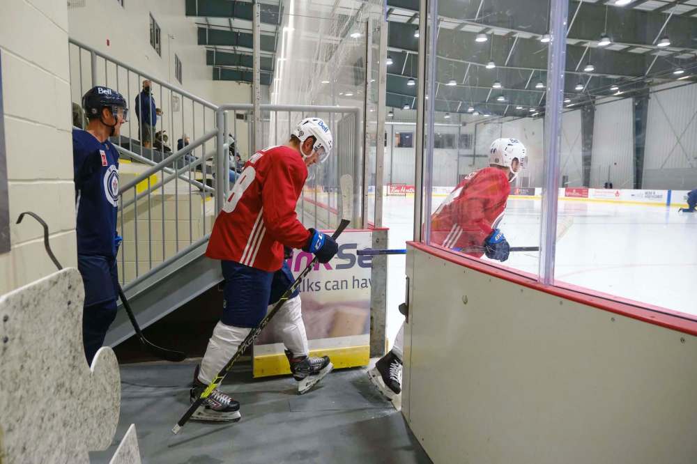 Nate Schmidt steps onto the ice with his new teammates on Friday at the MTS Iceplex. (Mike Deal / Winnipeg Free Press)