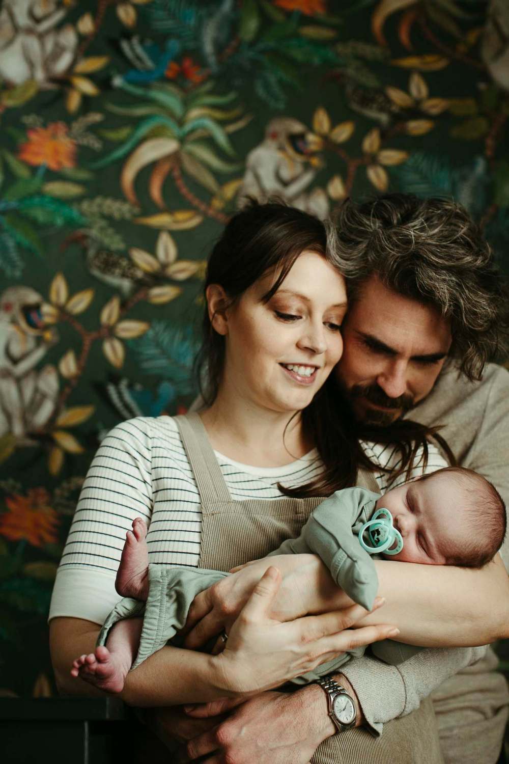 Whitney Atkinson photo
Roberta Landreth, with husband Dave and baby Finlay, illustrated the book.