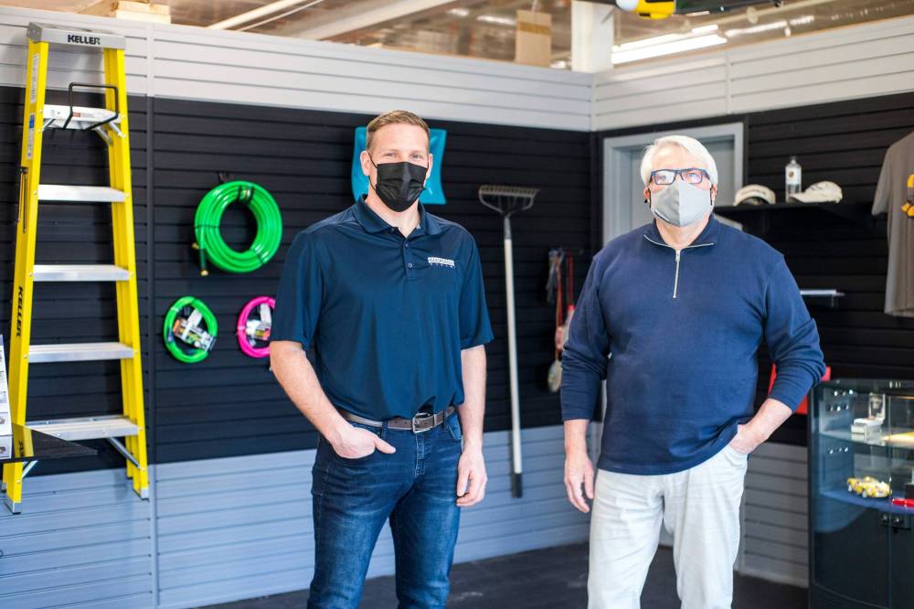 MIKAELA MACKENZIE / WINNIPEG FREE PRESS
Kevin Abraham (left) and Brian Friesen, co-owners of Garage Living, were connected when each had separately approached the franchisor about opening a Winnipeg location.