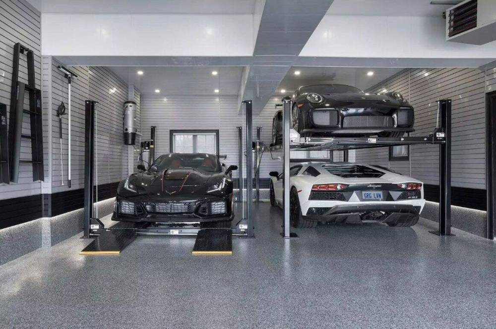 SUPPLIED
A dual car lift provides quick access to the homeowner’s Corvette ZR1, Lamborghini Aventador, and Porsche GT2 RS.