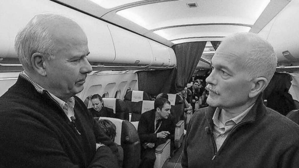 Leslie Stojsic photo
In this 2011 photo, Mansbridge chats with then-NDP leader Jack Layton during that year's election campaign. The NDP won 103 seats in the May 2011 election; Layton passsed away from cancer in August of that year.