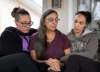 JESSICA LEE / WINNIPEG FREE PRESS
Alicia Thwaites (left) and Cindy McKague (right) sit with their mother Theresa Jobse.