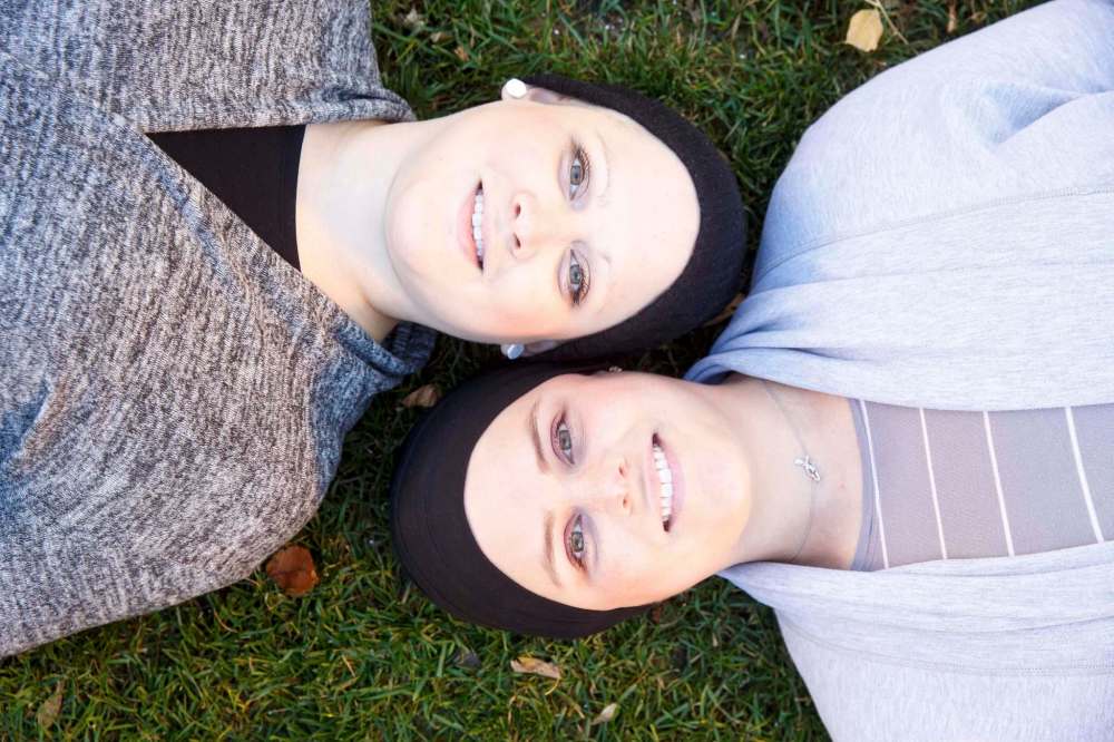 Just as Randi Stevens (right) was able to imagine life without thinking about her breast cancer, sister Hailey Belluk shared her own diagnosis. (Mike Deal / Winnipeg Free Press)
