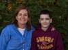 Meredith Walker, left, and her son Morgan, 16, sit in their back yard Thursday. (Chelsea Kemp / Brandon Sun)