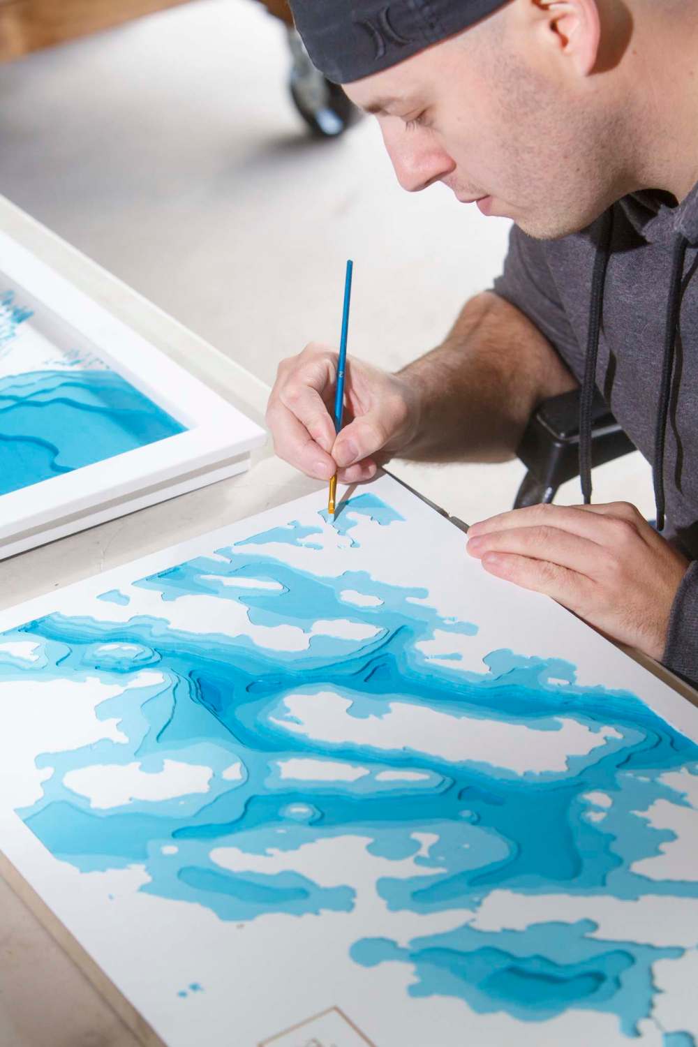 MIKE DEAL / WINNIPEG FREE PRESS
Kevin Morissette is the brains behind Lake Depth Maps. Three years ago he handmade a three-dimensional map of Clear Lake for a friend, using a scalpel to carve out the various depths. Everybody who saw it loved it, he made close to 30 more before investing a chunk of change in a digital router, which he now uses to turn out maps of lakes not just in Manitoba, but Ontario, BC, California, even the Philippines, using Google Maps and fishing depth chart websites to accurately recreate the body of water in question.