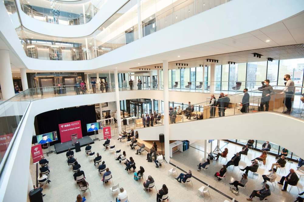 Mike Sudoma / Winnipeg Free Press
Attendees watch a video during the innovation centre’s grand opening.