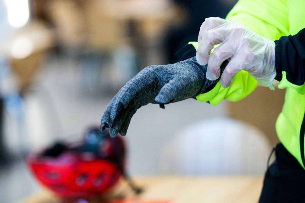 MIKAELA MACKENZIE / WINNIPEG FREE PRESS
On his hands, Perry wears latex gloves under soft-shell gloves