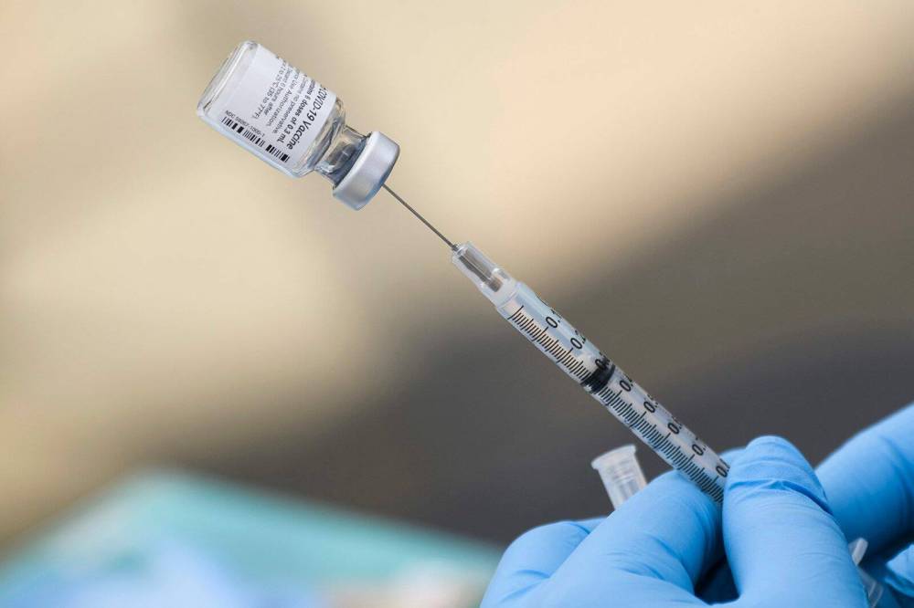 Patrick T. Fallon/AFP via Getty Images/TNS
Almost 4,800 adults received their first dose this month.