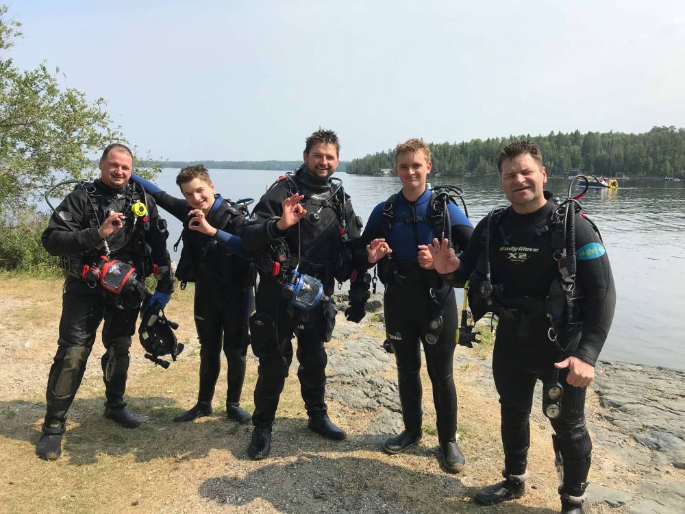 The Hutterian Emergency Aquatic Response Team during dive training: Paul Maendel (from left), Tyler Maendel, Manuel Maendel, Brendan Maendel and Brent Stoesz. (Supplied)